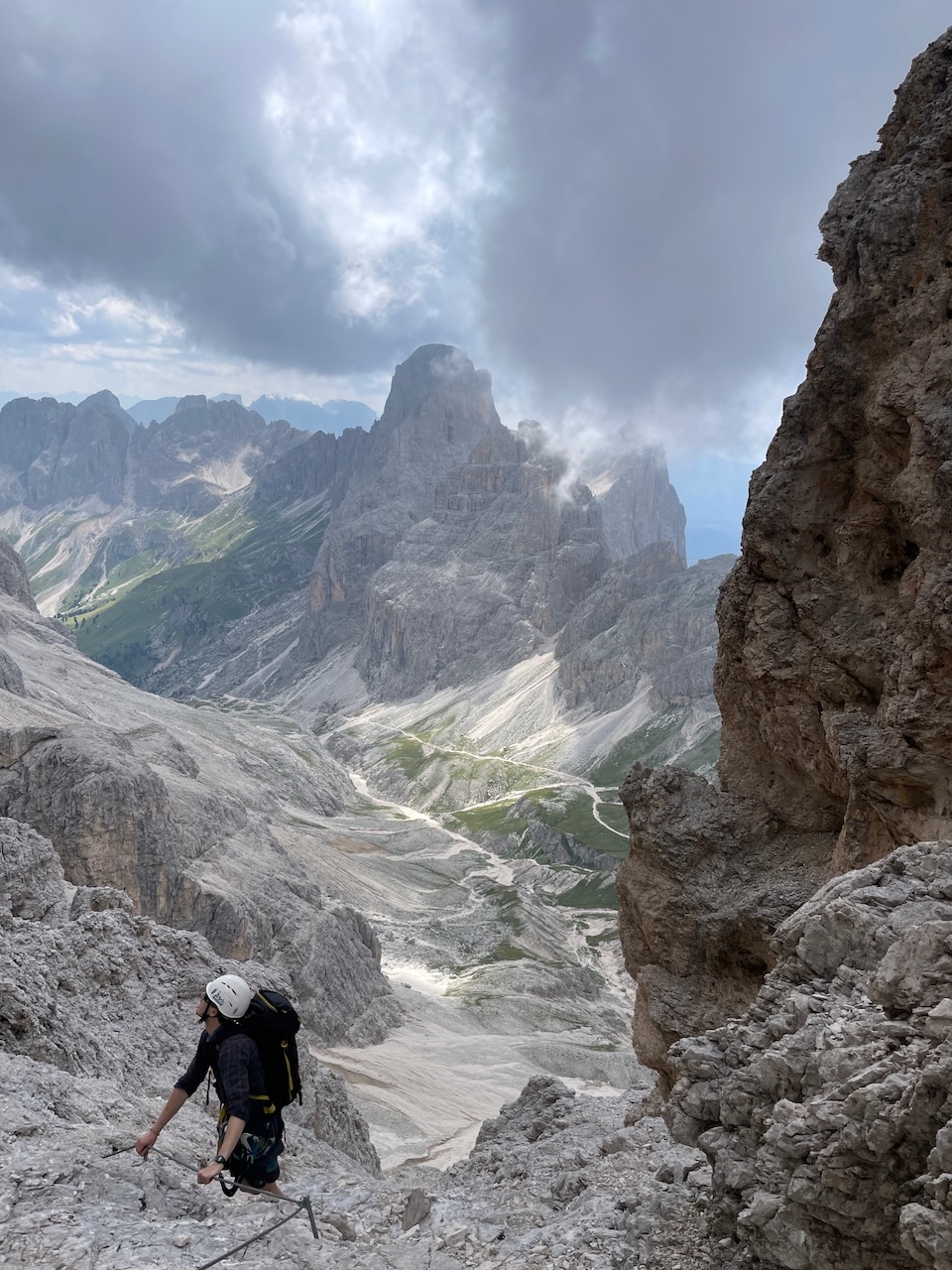 Benedikt standing in a steep rocky terrain